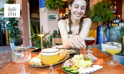 Luxe bier- of wijnproeverij + bijpassende tapasplank bij Proeflokaal 1711
